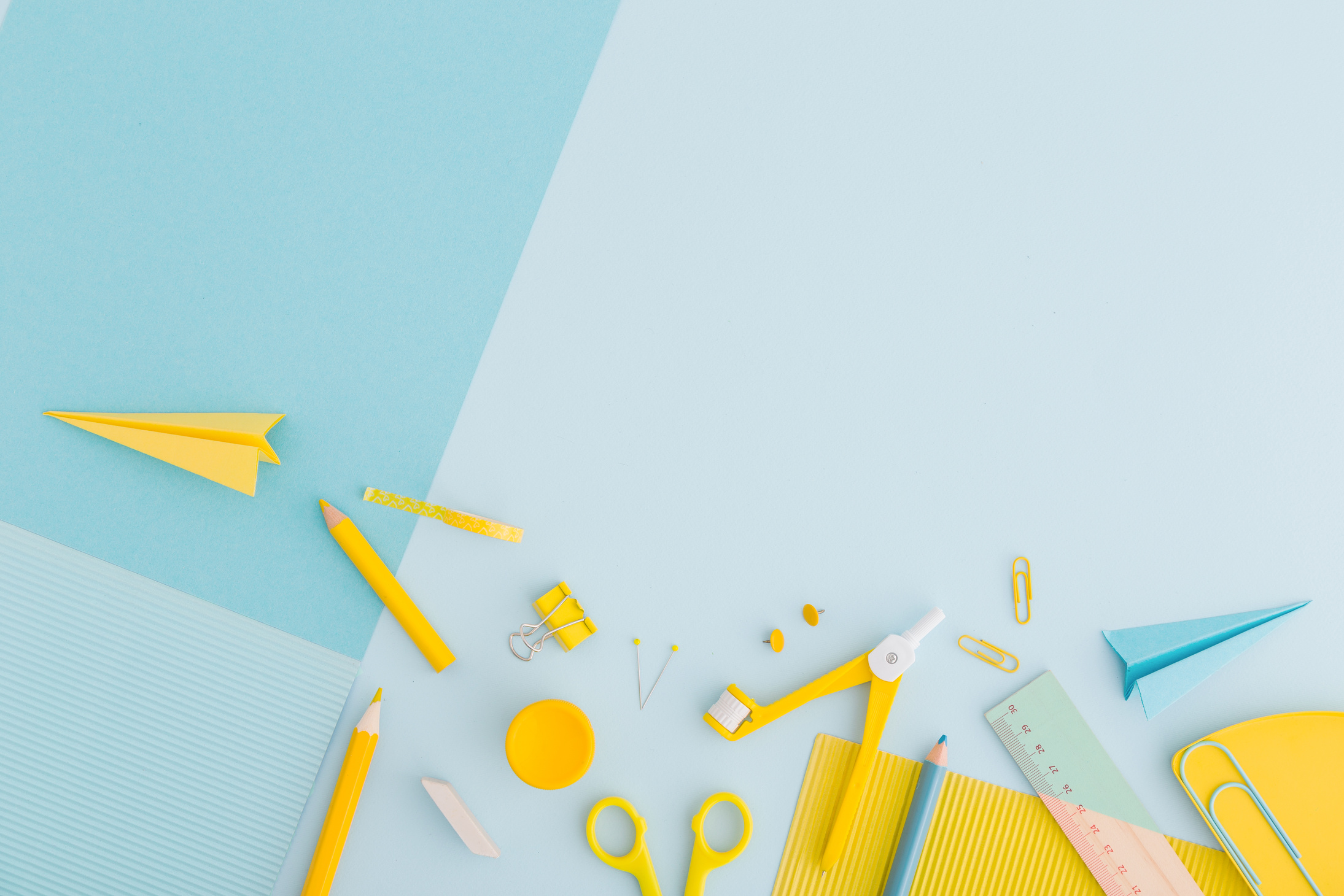 School supplies on a blue background. Back to school concept